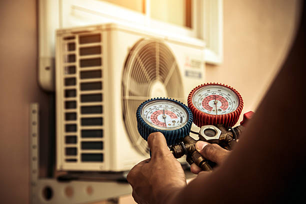 Professional Heat Pump Repair technician working in Onset, MA